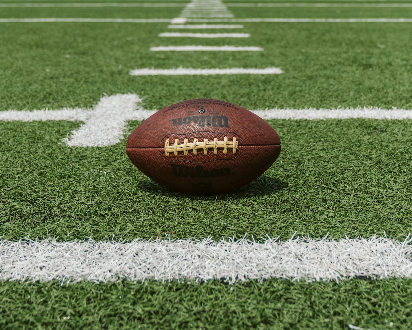 Illustrative photo of a baseball and glove — not a specific Tulsa stadium