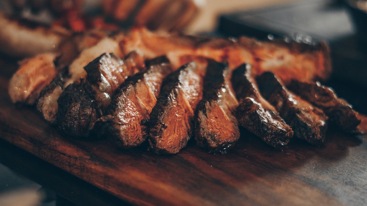 Illustrative photo of meat in a smoker